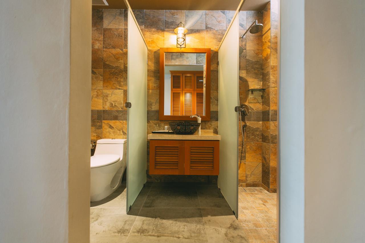 Tasik Villa International Resort Port Dickson Exterior photo Bathroom in a hotel